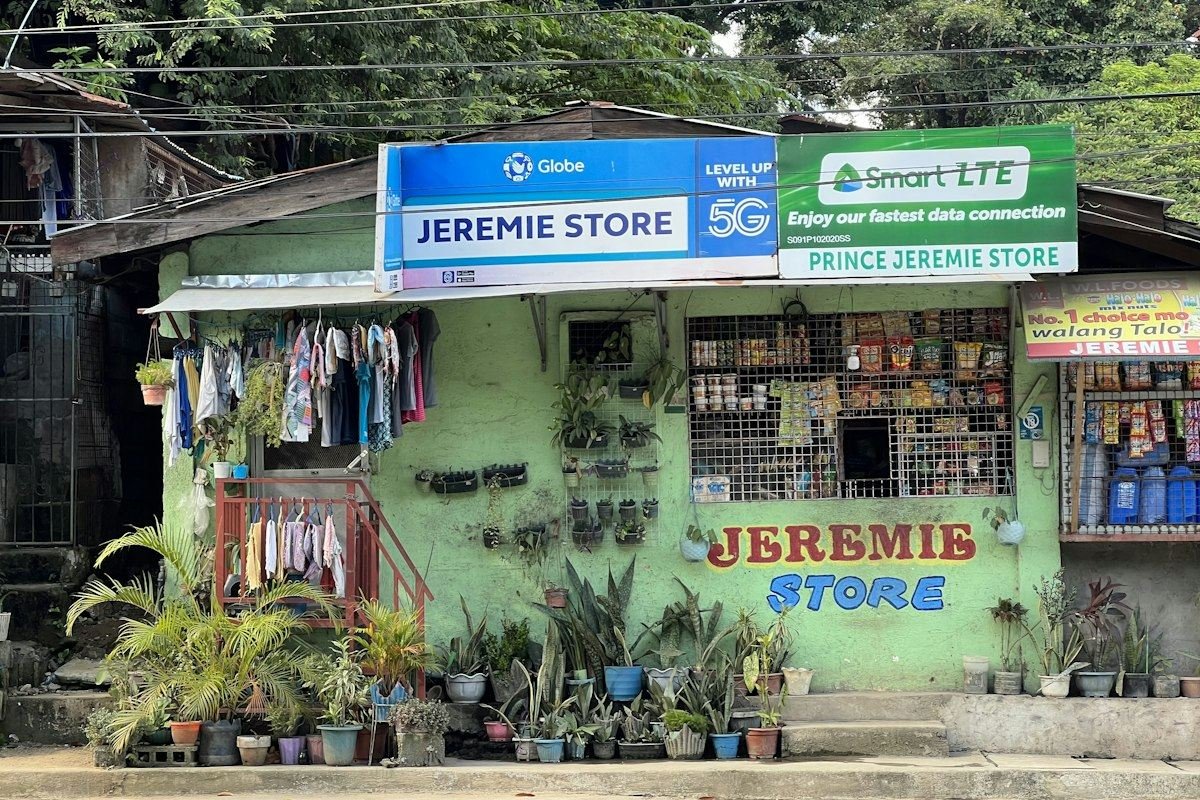 a store front with signs