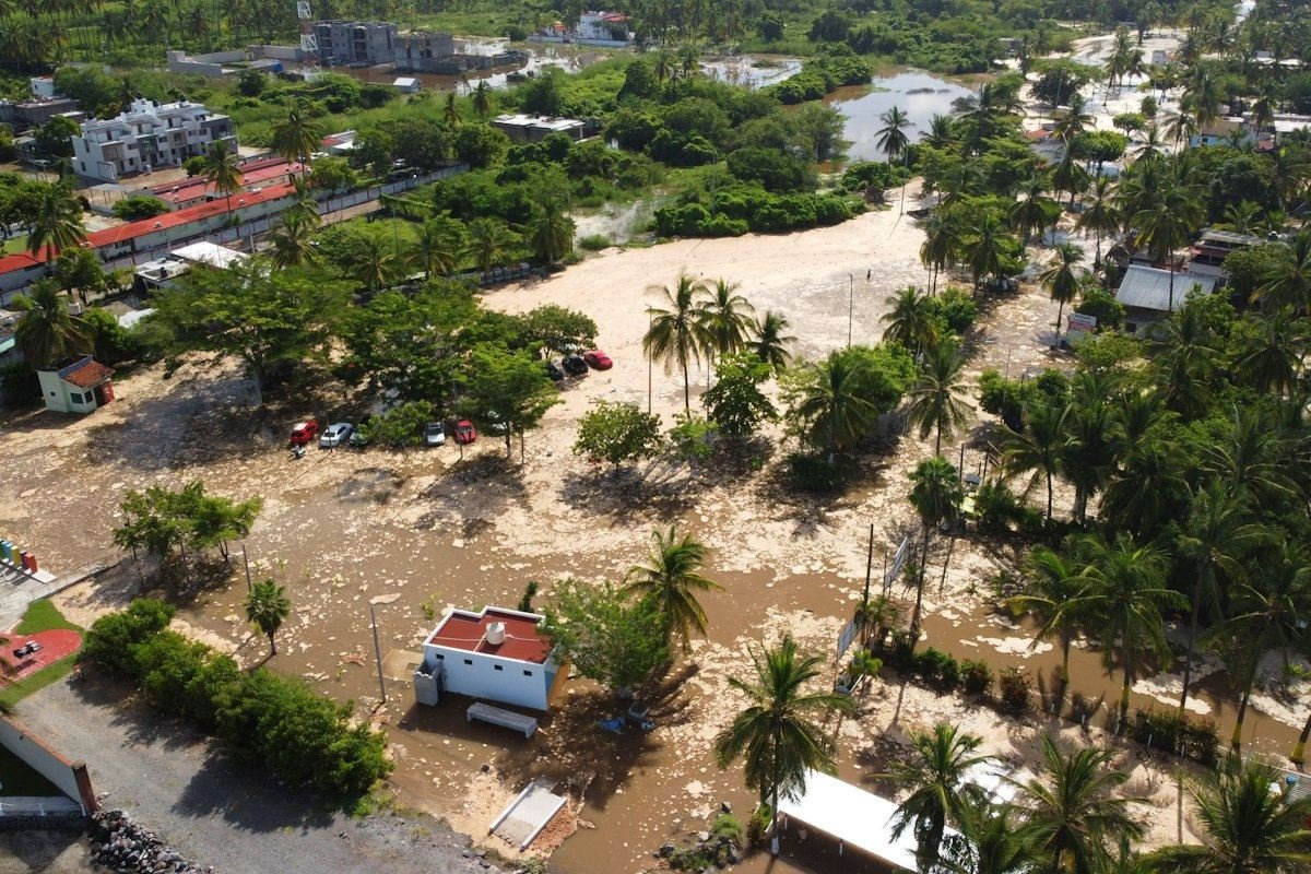 Flooded town with debris and submerged buildings