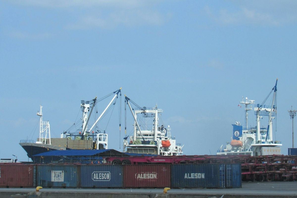 Cargo ships and shipping containers at a port