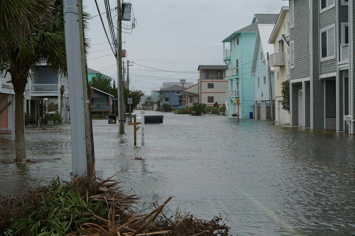 Street flooded with water and debris after storm
