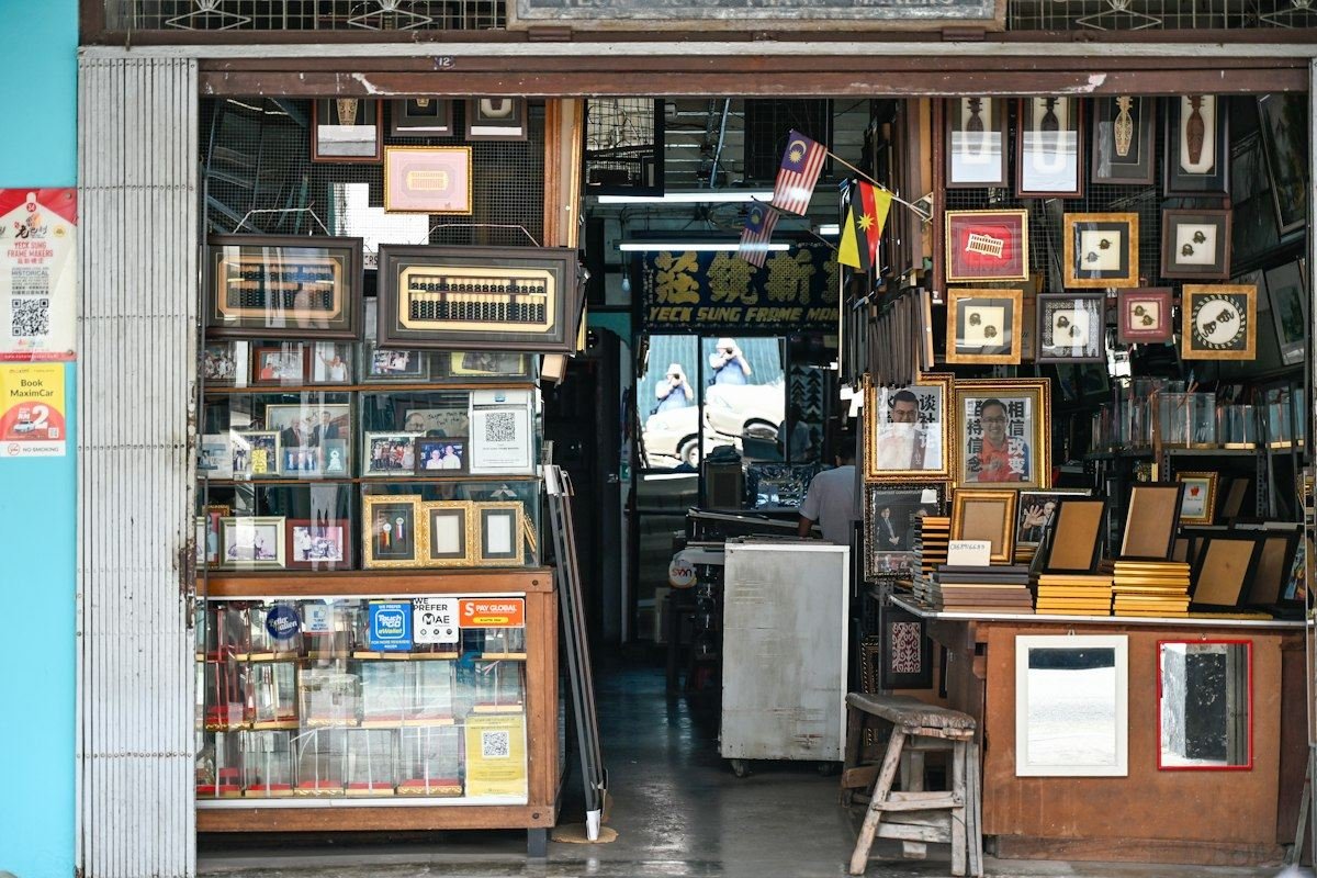 A small shop selling framed pictures and curiosities