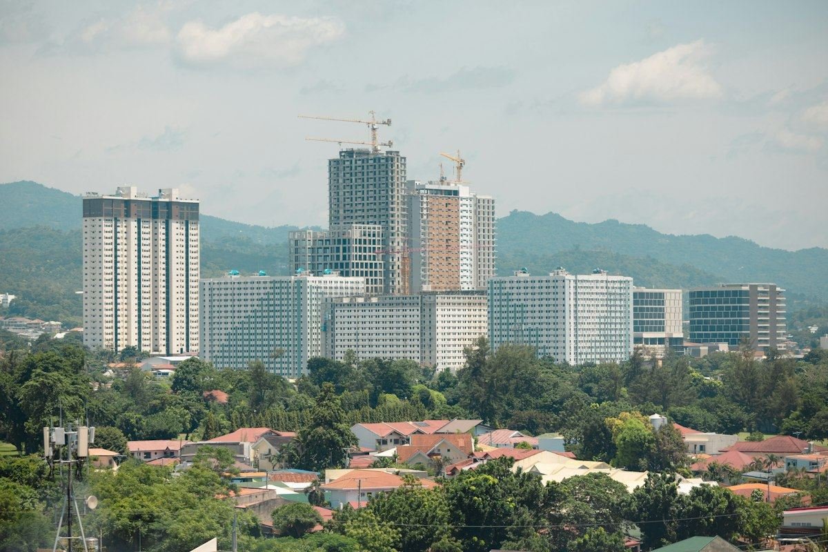 Modern high-rise buildings under construction in a city