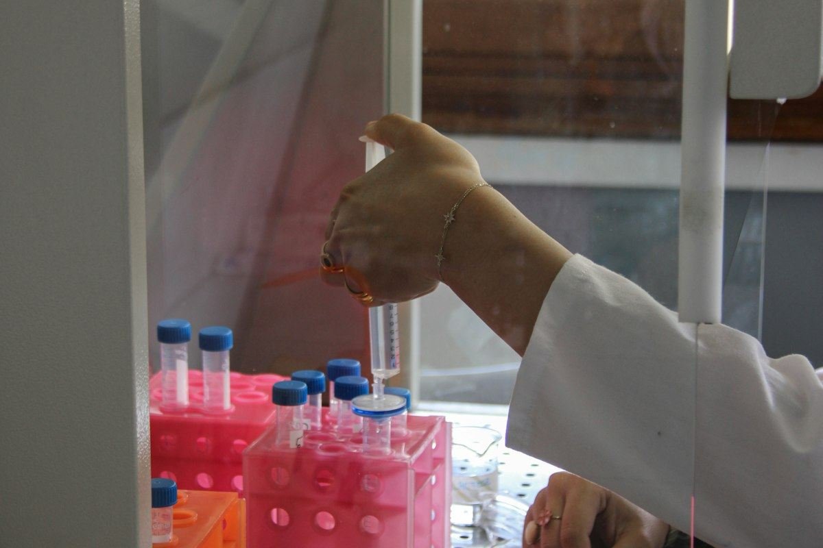 Scientist is conducting an experiment in a laboratory