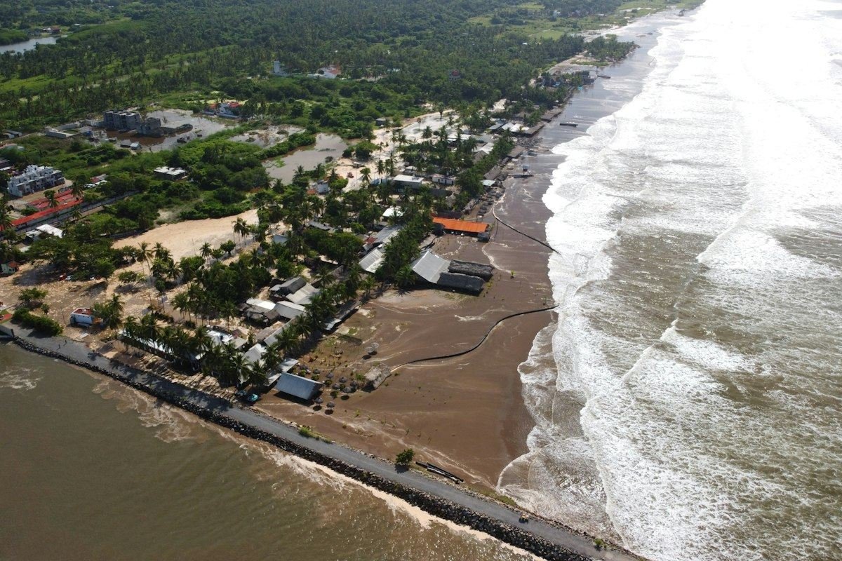 Coastal town flooded by ocean waves and storm surge