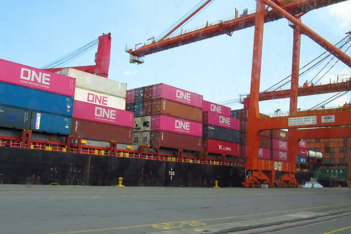 Cargo ship loaded with containers at a port