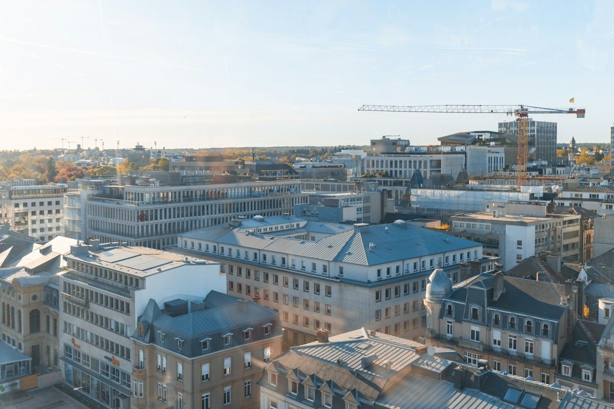 Modern buildings in a city with a construction crane